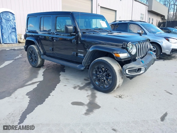 2023 Jeep Wrangler 4xe Sahara with VIN 1C4JJXP62PW613040, listed as a IAAI auction lot 41489171 with 36,818 mi miles. Bid and sale history available at carsss.com. Image 1.