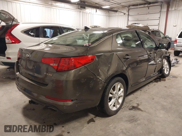 2013 Kia Optima EX with VIN 5XXGN4A72DG120129, listed as a IAAI auction lot 41858461 with 138,627 mi miles. Bid and sale history available at carsss.com. Image 4.