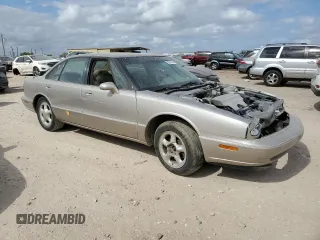 1997 Oldsmobile LSS z VIN 1G3HY52K9V4825297, wystawiony jako Copart lot #78541564 z przebiegiem Nie podano mil oraz Tytuł czysty. Historia ofert i sprzedaży dostępna na DreamBid. Obrazek 4.