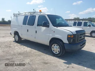 2012 Ford Econoline Cargo Commercial z VIN 1FTNE2EL7CDB10465, wystawiony jako IAAI lot #42181510 z przebiegiem 152 588 mil mil oraz . Historia ofert i sprzedaży dostępna na DreamBid. Obrazek 1.