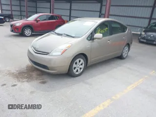 2007 Toyota Prius with VIN JTDKB20U777589888, listed as a IAAI auction lot 41870677 with 251,590 mi miles. Bid and sale history available at carsss.com. Image 2.