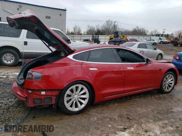 2017 Tesla Model S 100D with VIN 5YJSA1E29HF184387, listed as a Copart auction lot 39186144 with 101,387 mi miles and Salvage title. Bid and sale history available at DreamBid. Image 3.