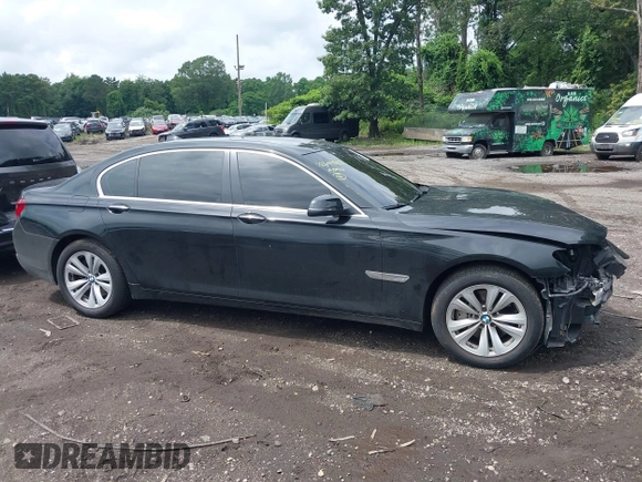 2015 BMW 7 Series 740Li xDrive with VIN WBAYF4C55FG291723, listed as a IAAI auction lot 42694382 with 101,140 mi miles and . Bid and sale history available at DreamBid. Image 13.