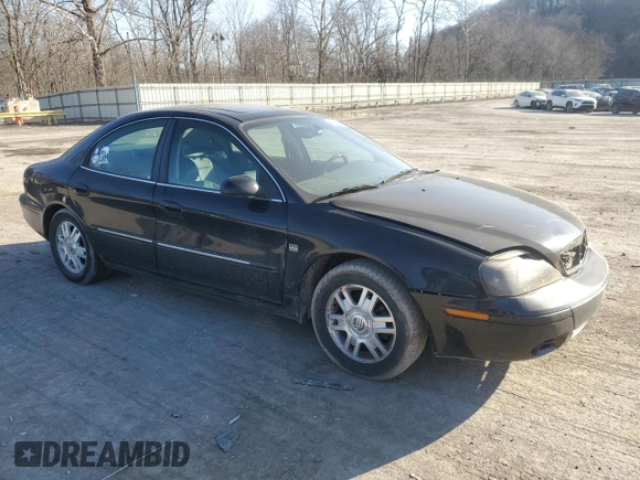 2005 Mercury Sable LS z VIN 1MEFM55S65A604240, wystawiony jako Copart lot #48103665 z przebiegiem 74 868 mil mil oraz Szkoda całkowita • Salvage title. Historia ofert i sprzedaży dostępna na DreamBid. Obrazek 4.