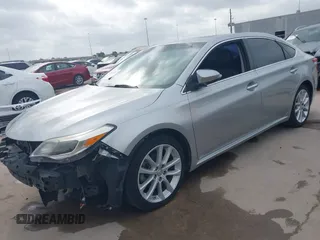 2015 Toyota Avalon Limited with VIN 4T1BK1EB2FU149980, listed as a IAAI auction lot 41897411 with 136,507 mi miles and . Bid and sale history available at DreamBid. Image 2.
