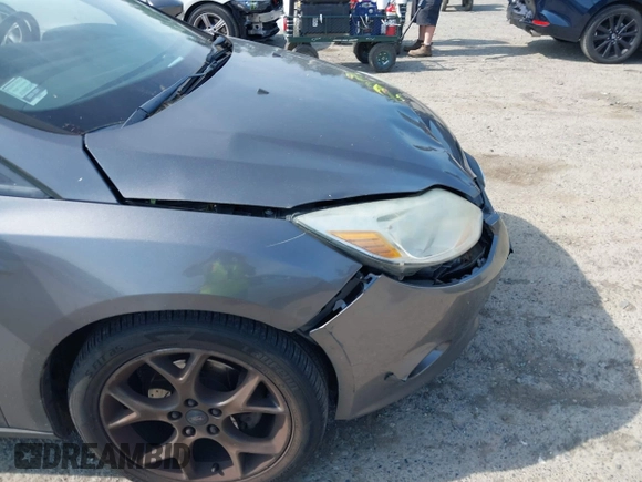 2013 Ford Focus SE with VIN 1FADP3F28DL233822, listed as a IAAI auction lot 42583041 with 135,728 mi miles and . Bid and sale history available at DreamBid. Image 14.