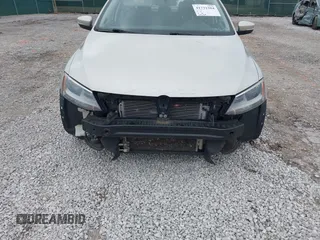 2012 Volkswagen Jetta TDI w/Premium with VIN 3VWLL7AJ2CM317216, listed as a IAAI auction lot 41731204 with 320,474 mi miles and . Bid and sale history available at DreamBid. Image 6.