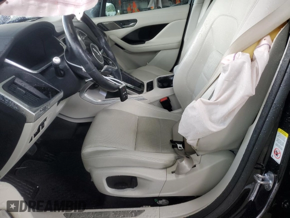 2020 Jaguar I-Pace SE с VIN SADHC2S16L1F88522, выставлен на аукционе Copart как лот 65587214 с пробегом 19 533 миль миль и Списание • Salvage title. История ставок и продаж доступна на DreamBid. Изображение 7.