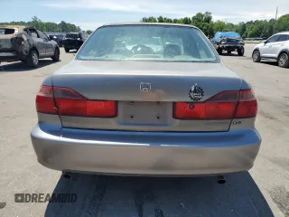 2000 Honda Accord EX с VIN 1HGCG1651YA085715, выставлен на аукционе Copart как лот 56040745 с пробегом 316 369 миль миль и Списание • Salvage title. История ставок и продаж доступна на DreamBid. Изображение 6.