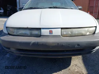 1999 Saturn SL z VIN 1G8ZH5282XZ178928, wystawiony jako IAAI lot #41758412 z przebiegiem 249 418 mil mil oraz . Historia ofert i sprzedaży dostępna na DreamBid. Obrazek 13.