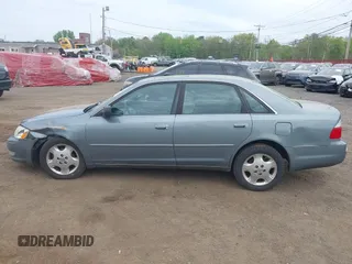 2003 Toyota Avalon XL z VIN 4T1BF28B63U331439, wystawiony jako IAAI lot #42161096 z przebiegiem 217 296 mil mil oraz . Historia ofert i sprzedaży dostępna na DreamBid. Obrazek 14.