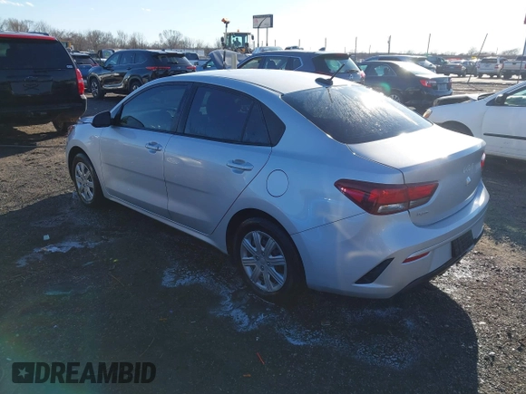 2023 Kia Rio LX with VIN 3KPA24ADXPE606463, listed as a IAAI auction lot 41728523 with 8,909 mi miles and . Bid and sale history available at DreamBid. Image 3.