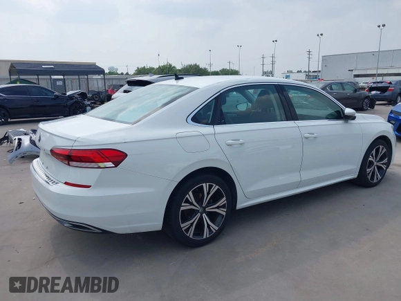 2021 Volkswagen Passat SE z VIN 1VWSA7A32MC014376, wystawiony jako IAAI lot #42314372 z przebiegiem 81 209 mil mil oraz . Historia ofert i sprzedaży dostępna na DreamBid. Obrazek 4.