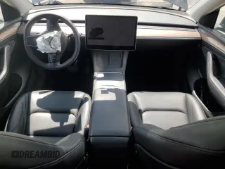 2024 Tesla Model Y Long Range с VIN 7SAYGAEEXRF115893, выставлен на аукционе Copart как лот 55174035 с пробегом 68 078 миль миль и Списание • Salvage title. История ставок и продаж доступна на DreamBid. Изображение 8.