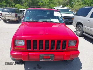 1998 Jeep Cherokee Sport with VIN 1J4FT68S2WL256846, listed as a IAAI auction lot 41998490 with 198,936 mi miles. Bid and sale history available at carsss.com. Image 6.