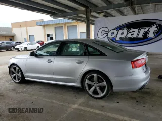 2014 Audi A6 Prestige z VIN WAUHGAFC1EN143102, wystawiony jako Copart lot #53692145 z przebiegiem 101 503 mil mil oraz Szkoda całkowita • Salvage title. Historia ofert i sprzedaży dostępna na DreamBid. Obrazek 2.