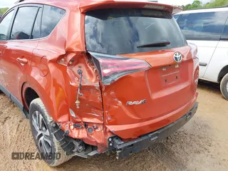 2016 Toyota RAV4 LE with VIN JTMZFREV9GJ074360, listed as a IAAI auction lot 42013611 with 87,578 mi miles. Bid and sale history available at carsss.com. Image 6.