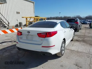 2014 Kia Optima LX with VIN 5XXGM4A73EG322983, listed as a IAAI auction lot 41708101 with 84,334 mi miles. Bid and sale history available at carsss.com. Image 4.