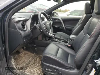 2018 Toyota RAV4 Hybrid SE with VIN JTMJJREV6JD225530, listed as a Copart auction lot 52000985 with 150,642 mi miles and Salvage title. Bid and sale history available at DreamBid. Image 7.