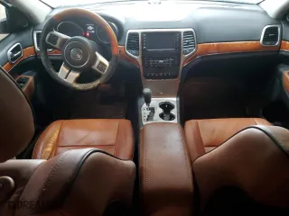 2012 Jeep Grand Cherokee Overland with VIN 1C4RJFCT2CC318931, listed as a Copart auction lot 47194825 with 65,165 mi miles and Salvage Title. Bid and sale history available at carsss.com. Image 8.