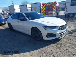 2022 Acura TLX w/A-Spec Package with VIN 19UUB5F52NA005022, listed as a IAAI auction lot 40977803 with 9,665 mi miles and . Bid and sale history available at DreamBid. Image 1.