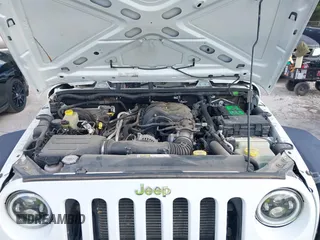 2016 Jeep Wrangler Unlimited Sport RHD z VIN 1C4BJWKG3GL293694, wystawiony jako IAAI lot #42569773 z przebiegiem 140 243 mil mil oraz . Historia ofert i sprzedaży dostępna na DreamBid. Obrazek 10.