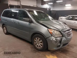 2010 Honda Odyssey EX z VIN 5FNRL3H40AB092365, wystawiony jako IAAI lot #42292169 z przebiegiem 123 432 mil mil oraz . Historia ofert i sprzedaży dostępna na DreamBid. Obrazek 1.