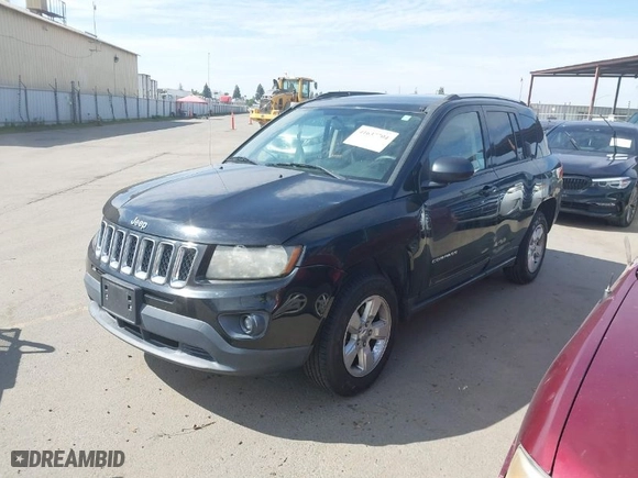 2014 Jeep Compass Sport with VIN 1C4NJCBA6ED774568, listed as a IAAI auction lot 41637704 with 116,136 mi miles. Bid and sale history available at carsss.com. Image 2.