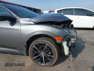 2021 Honda Civic Sport with VIN SHHFK7H44MU217741, listed as a IAAI auction lot 42029373 with 68,572 mi miles and . Bid and sale history available at DreamBid. Image 18.