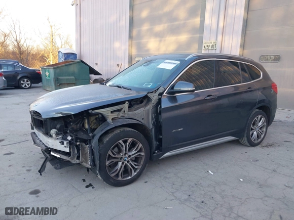 2017 BMW X1 xDrive28i with VIN WBXHT3C33H5F87591, listed as a IAAI auction lot 41256899 with 69,362 mi miles. Bid and sale history available at carsss.com. Image 2.