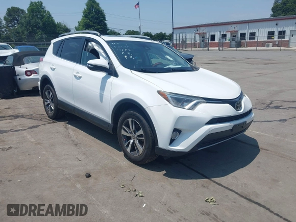 2018 Toyota RAV4 XLE z VIN 2T3WFREV1JW459553, wystawiony jako IAAI lot #42423474 z przebiegiem 129 523 mil mil oraz . Historia ofert i sprzedaży dostępna na DreamBid. Obrazek 1.