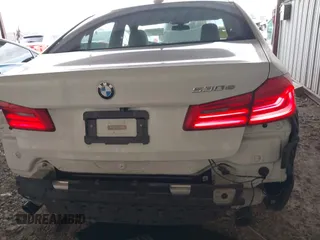2018 BMW 5 Series 530e with VIN WBAJA9C57JB034128, listed as a IAAI auction lot 41800329 with 66,684 mi miles and . Bid and sale history available at DreamBid. Image 6.