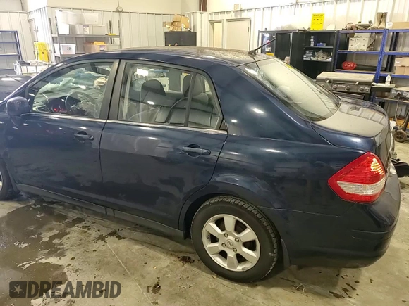 2009 Nissan Versa 1.8 SL with VIN 3N1BC11EX9L352876, listed as a Copart auction lot 45684175 with 252,113 mi miles and Salvage Title. Bid and sale history available at carsss.com. Image 11.