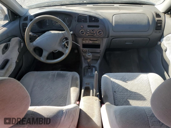 1999 Mitsubishi Mirage DE with VIN JA3AY26AXXU050527, listed as a Copart auction lot 74435914 with 101,224 mi miles and Salvage title. Bid and sale history available at DreamBid. Image 8.