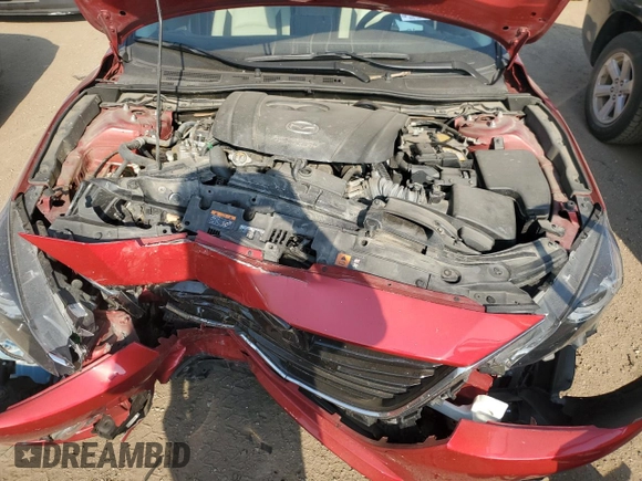 2016 Mazda 3 S Grand Touring z VIN JM1BM1N36G1342594, wystawiony jako Copart lot #57041185 z przebiegiem Nie podano mil oraz Szkoda całkowita • Salvage title. Historia ofert i sprzedaży dostępna na DreamBid. Obrazek 11.