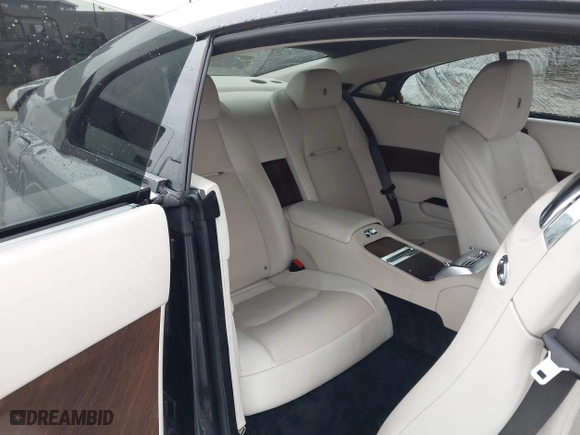 2016 Rolls-Royce Wraith with VIN SCA665C59GUX86162, listed as a IAAI auction lot 41289481 with 47,566 mi miles. Bid and sale history available at carsss.com. Image 8.