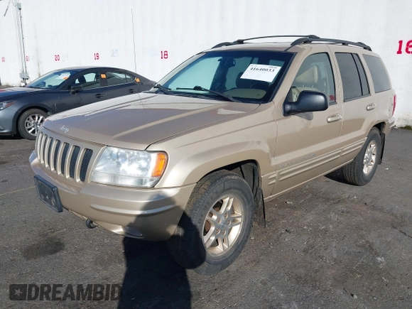 1999 Jeep Grand Cherokee Limited with VIN 1J4GW68N3XC688112, listed as a IAAI auction lot 41640033 with 196,851 mi miles. Bid and sale history available at carsss.com. Image 2.