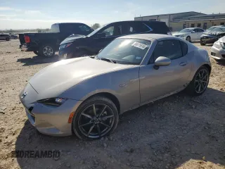 2023 Mazda MX-5 Miata Grand Touring z VIN JM1NDAM72P0551953, wystawiony jako Copart lot #84071614 z przebiegiem 19 955 mil mil oraz Szkoda całkowita • Salvage title. Historia ofert i sprzedaży dostępna na DreamBid. Obrazek 1.