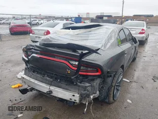 2020 Dodge Charger Scat Pack z VIN 2C3CDXGJXLH107344, wystawiony jako IAAI lot #41888453 z przebiegiem Nie podano mil oraz . Historia ofert i sprzedaży dostępna na DreamBid. Obrazek 4.