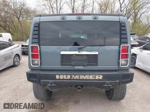 2005 Hummer H2 SUV z VIN 5GRGN23U95H100888, wystawiony jako IAAI lot #41937351 z przebiegiem 202 969 mil mil oraz . Historia ofert i sprzedaży dostępna na DreamBid. Obrazek 16.