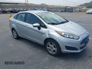 2016 Ford Fiesta SE with VIN 3FADP4BJ6GM122174, listed as a IAAI auction lot 42161294 with 138,090 mi miles. Bid and sale history available at carsss.com. Image 1.