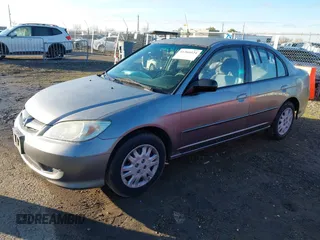 2004 Honda Civic LX with VIN 2HGES15594H525975, listed as a IAAI auction lot 41266024 with 241,598 mi miles. Bid and sale history available at carsss.com. Image 2.