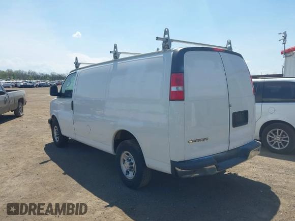 2019 Chevrolet Express Cargo with VIN 1GCWGAFP3K1249390, listed as a IAAI auction lot 42101049 with 82,211 mi miles. Bid and sale history available at carsss.com. Image 3.