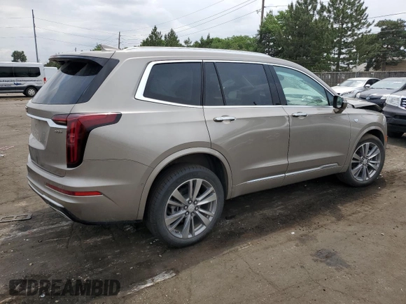 2022 Cadillac XT6 Premium Luxury with VIN 1GYKPDRS5NZ180296, listed as a Copart auction lot 59081184 with 21,380 mi miles and Salvage title. Bid and sale history available at DreamBid. Image 3.