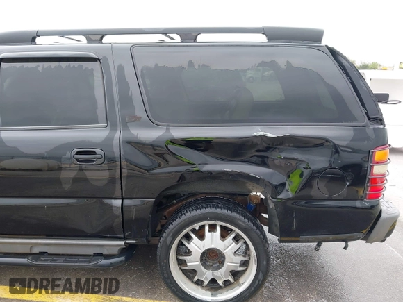 2002 Chevrolet Suburban LT with VIN 3GNFK16Z72G165792, listed as a IAAI auction lot 41921486 with 237,675 mi miles. Bid and sale history available at carsss.com. Image 6.