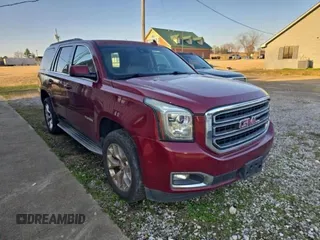 2016 GMC Yukon SLT with VIN 1GKS1BKC4GR346877, listed as a Copart auction lot 54334705 with 131,696 mi miles and Salvage Title. Bid and sale history available at carsss.com. Image 1.