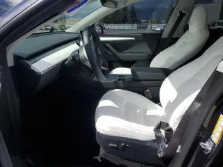 2024 Tesla Model Y z VIN 7SAYGDED1RF089192, wystawiony jako Copart lot #48752085 z przebiegiem 7 643 mil mil oraz Szkoda całkowita • Salvage title. Historia ofert i sprzedaży dostępna na DreamBid. Obrazek 7.