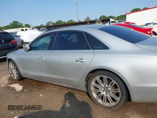 2013 Audi A8 3.0L с VIN WAURGAFD7DN016351, выставлен на аукционе IAAI как лот 42372202 с пробегом 90 753 миль миль и . История ставок и продаж доступна на DreamBid. Изображение 14.