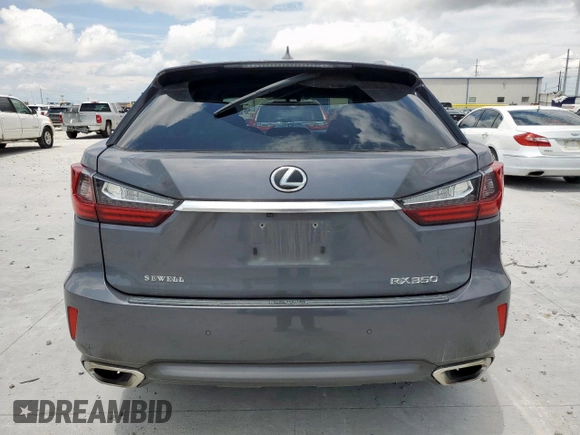 2016 Lexus RX 350 with VIN 2T2BZMCA4GC032889, listed as a Copart auction lot 62351685 with 114,556 mi miles and Salvage title. Bid and sale history available at DreamBid. Image 6.