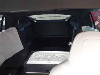 2017 Tesla Model X 90D z VIN 5YJXCDE23HF077126, wystawiony jako IAAI lot #42035067 z przebiegiem Nie podano mil oraz . Historia ofert i sprzedaży dostępna na DreamBid. Obrazek 8.